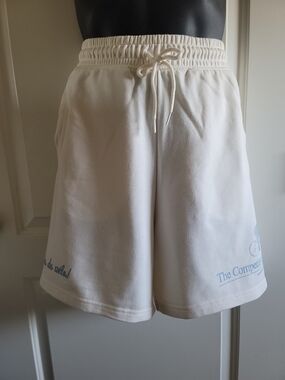H&M Cream Drawstring Athletic Shorts with Blue Logo